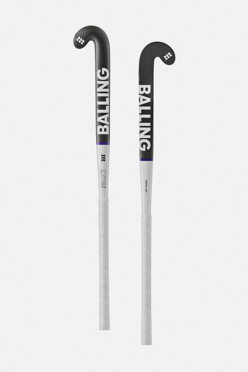 field hockey stick and ball black and white